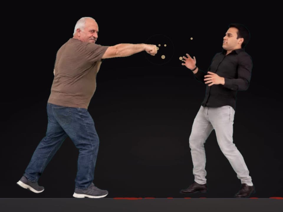 One fighter's punch landing on another